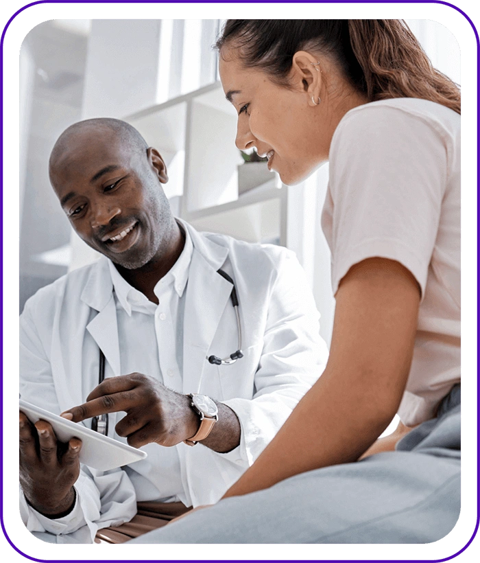 Actor portrayal of a doctor speaking to a patient